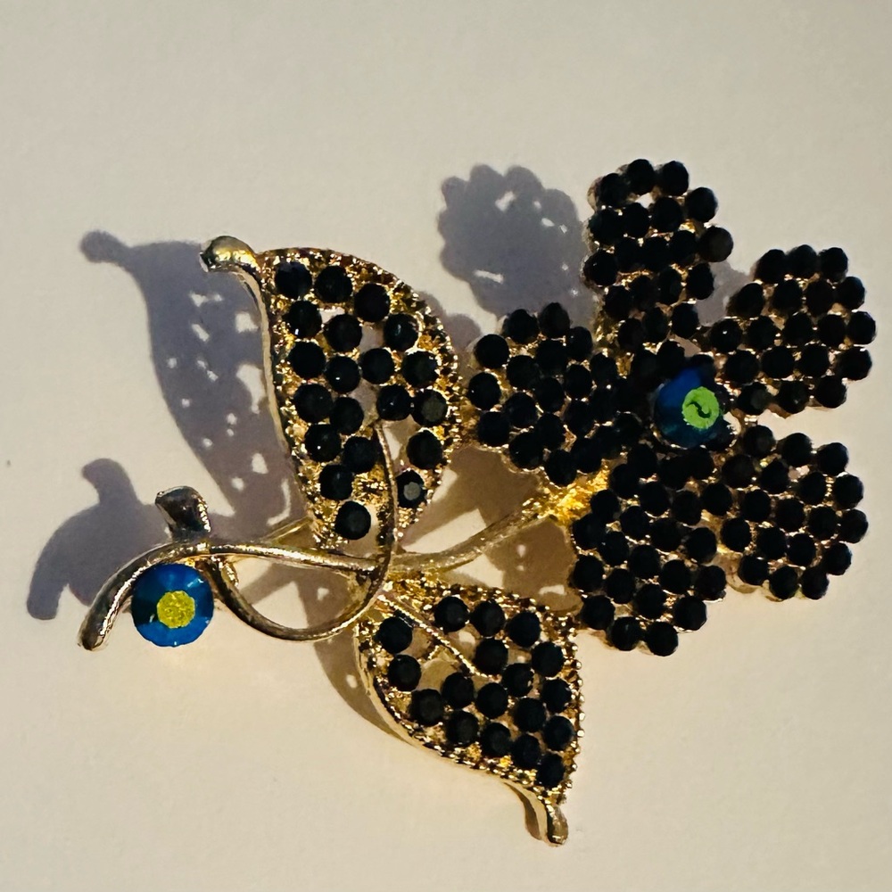 Elegant Gold Tone with Dark Blue Rhinestones Floral Brooch